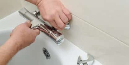 Shower valve replacement to end temperature swings.