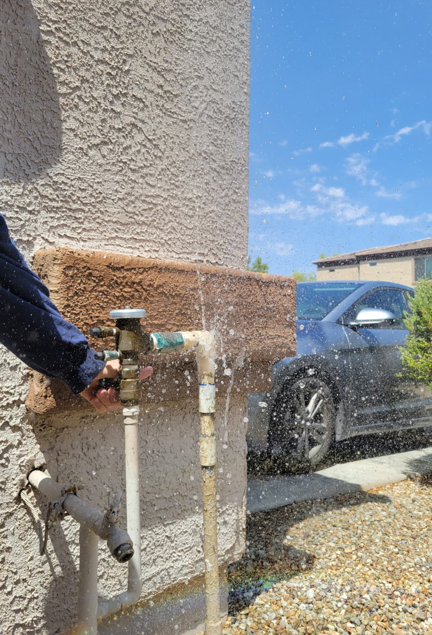 A leaking water pipe is one of the warning signs of plumbing issues after rain.